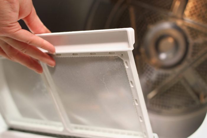 replacing the screen in the lint trap of a clothes dryer