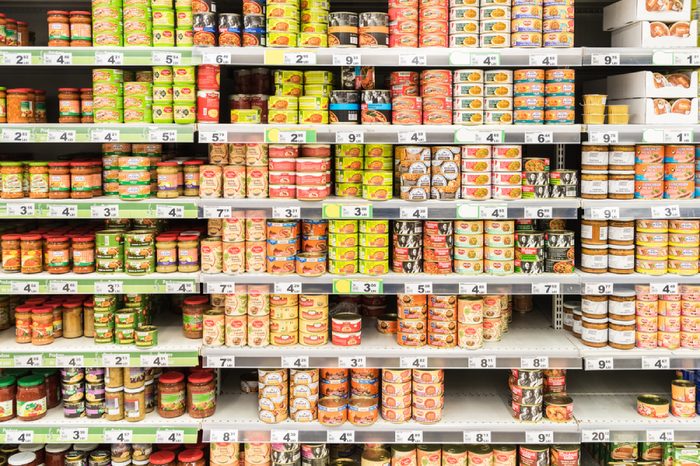 BUCHAREST, ROMANIA - MARCH 01, 2015: Canned Food On Supermarket Stand.