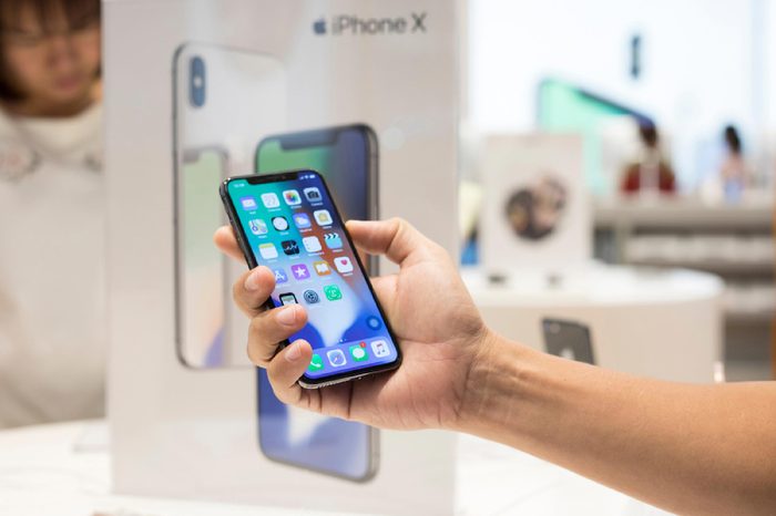 Nakhonratchasrima,Thailand, NOV 27, 2017: A men holding New iPhone X on sale in Apple Store