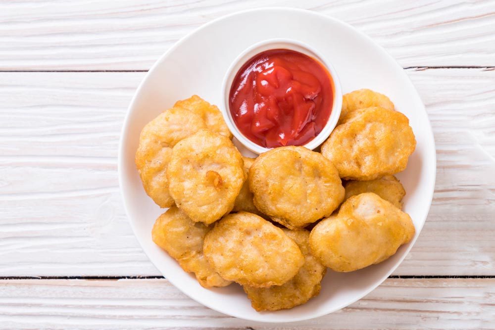 Chicken nuggets with sauce - unhealthy food