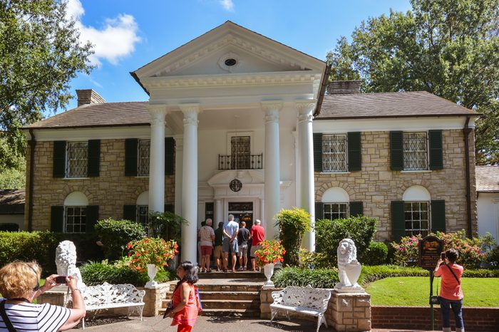Memphis TN/USA - Sep. 21, 2017: Tourists visit Elvis Presley's Graceland Mansion. The mansion had been placed on the National Register of Historic Places.