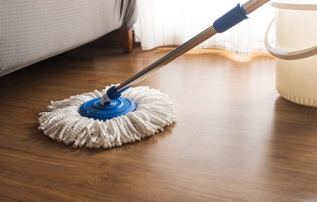 Mop cleaning on wooden floor