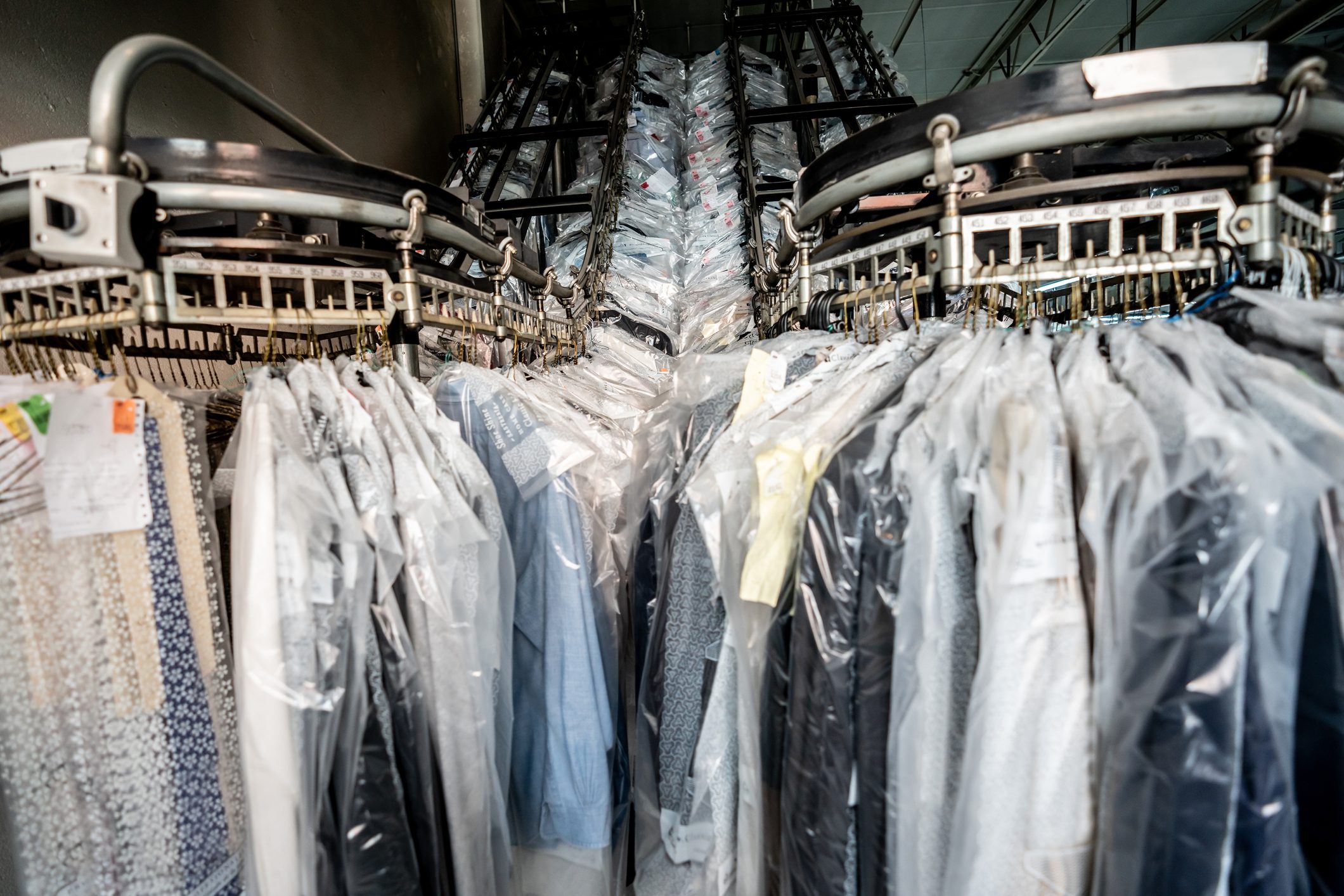 Conveyor belt at an industrial laundry service with clean clothes