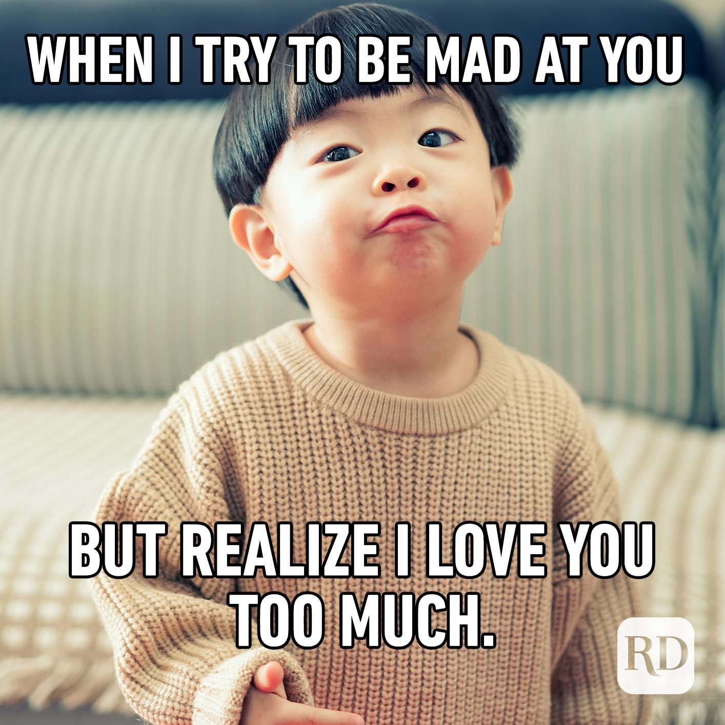 Angry child. Meme text: When I try to be mad at you but realize I love you too much.
