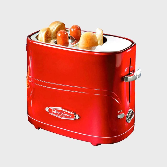 Red retro toaster cooks hot dogs; features two buns and sausages inserted. Text: 