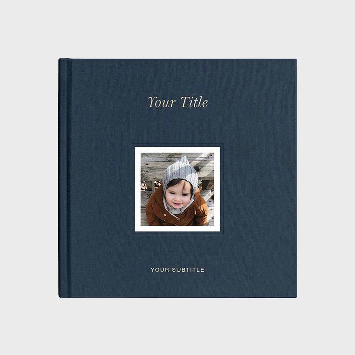 Book cover features central photo of a smiling child in a winter hat, with 