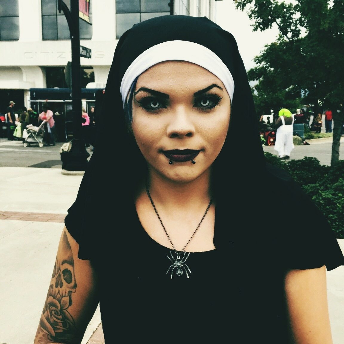 Close Up Portrait Of Spooky Woman In Nun Headdress During Halloween