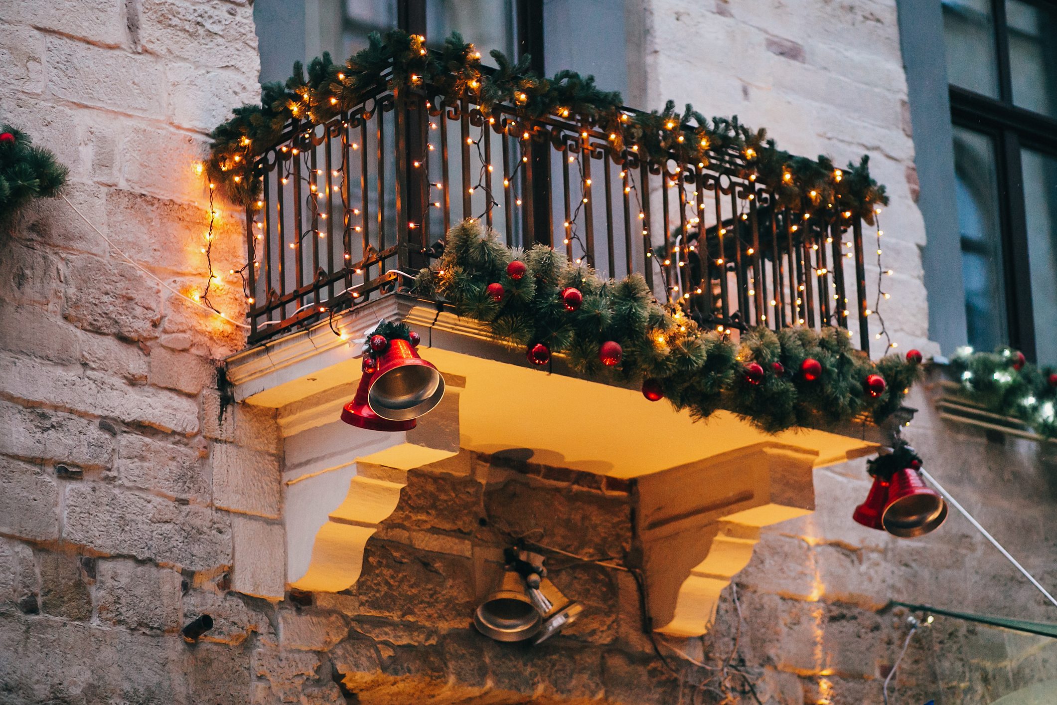 christmas decorations on home balcony
