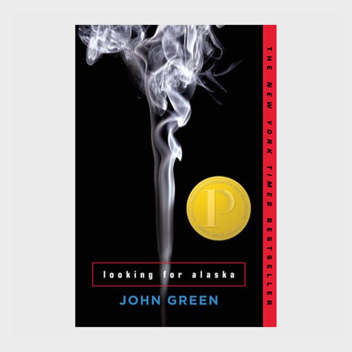 Smoke rises against a black background, with 