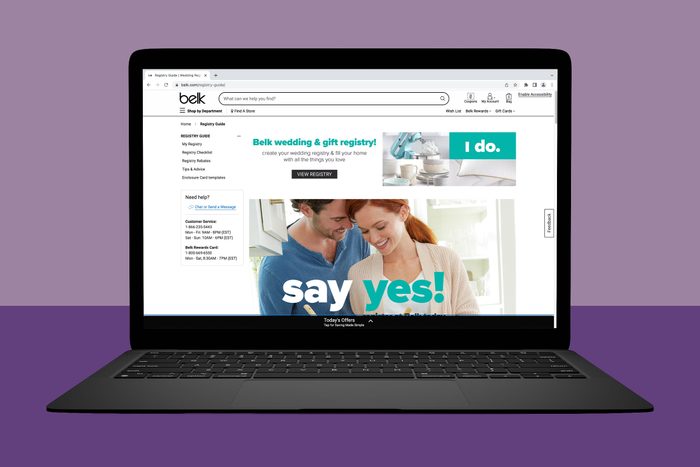 A laptop displays a wedding registry website. A couple smiles while browsing items, surrounded by kitchenware images. Major text: 
