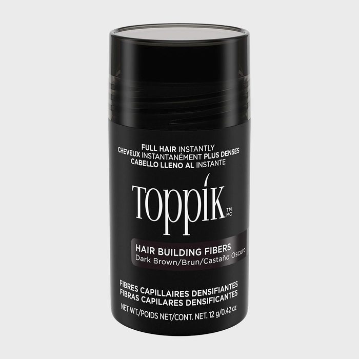 A black cylindrical container displays 