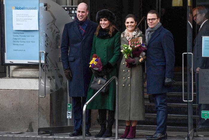 Britain's Prince William, Duke of Cambridge, Britain's Catherine, Duchess of Cambridge, Sweden's Crown Princess Victoria and Prince Daniel pose for a photo at the entrance to the Nobel Museum in Stockholm